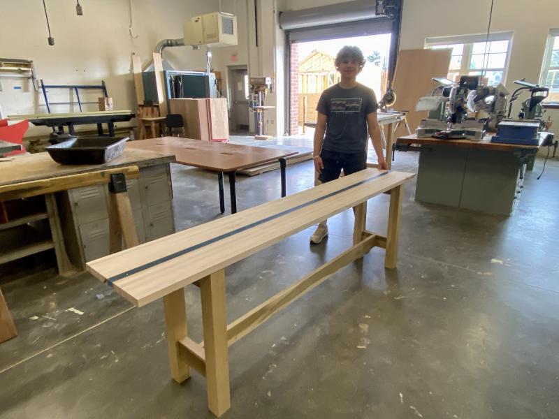 For his school project, Cape High junior Luke McCarthy is making a shuffleboard table with epoxy between two pieces of maple for his family game room.